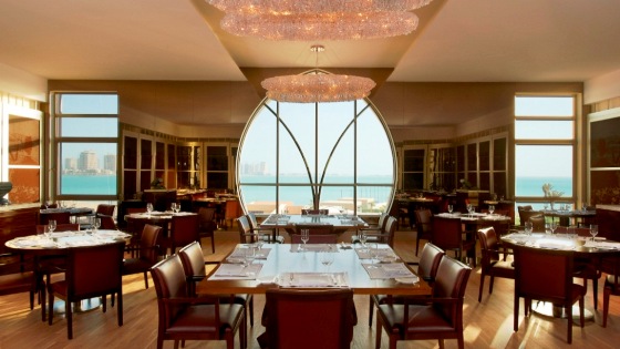 refined butter presentation Opal by Gordon Ramsay casual dining interior St. Regis Doha