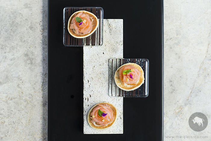 tropical dinnerware square glass plates limestone base St Regis Mauritius MyGlassStudio