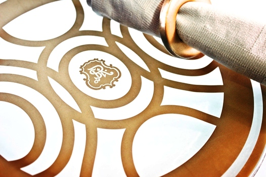 custom dinner plate designs detail St. Regis logo Saadiyat Island MyGlassStudio