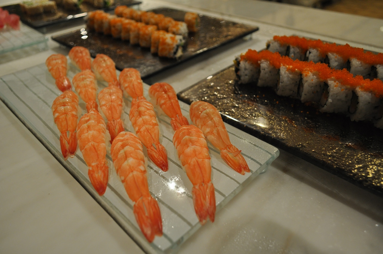 glass serving platters on catering buffet table at Fairways Westin Abu Dhabi