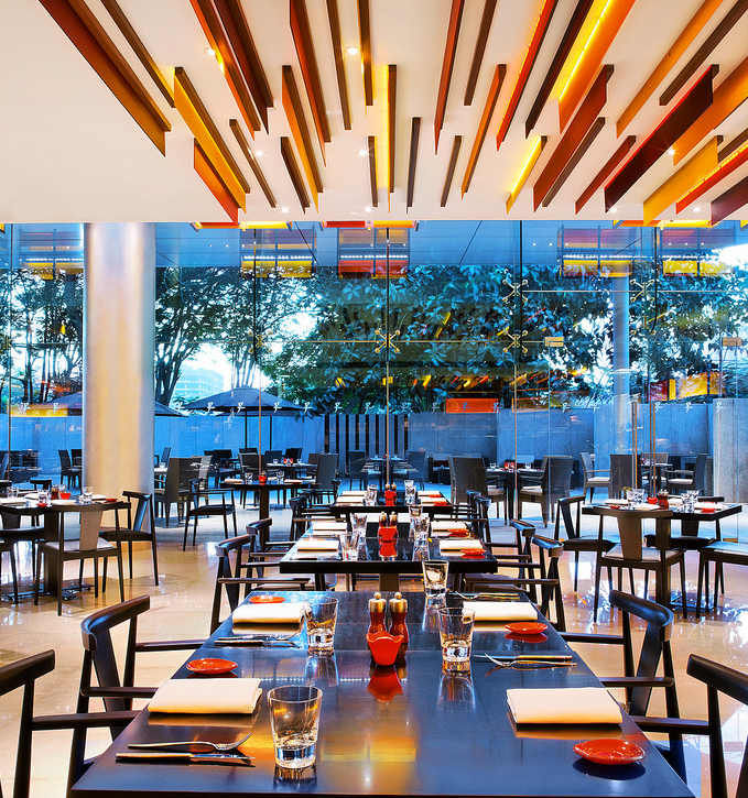 table setting red glass dinnerware Prego restaurant Westin Mumbai Garden City MyGlassStudio