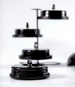 black cake stand with dome